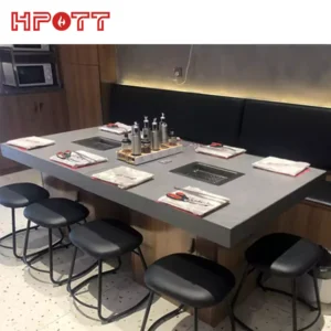 restaurant table with korean bbq grill
